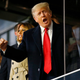 Former president of the United States Donald Trump waves prior to Game Four of the World Series between the Houston Astros and the Atlanta Braves Trust Park on October 30, 2021, in Atlanta, Georgia.